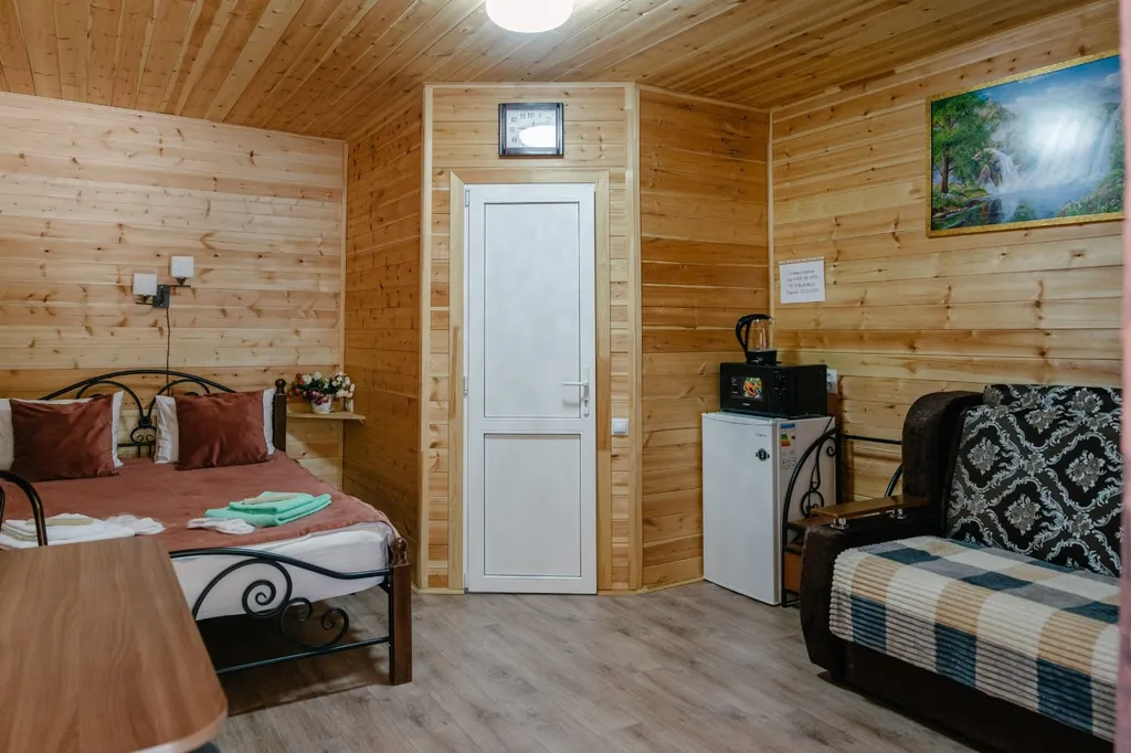 Домик номерного типа с общей террасой