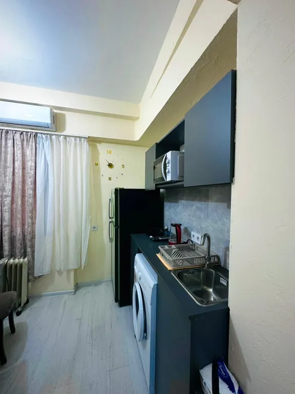 В центре рядом с музеем Сергея Параджанова