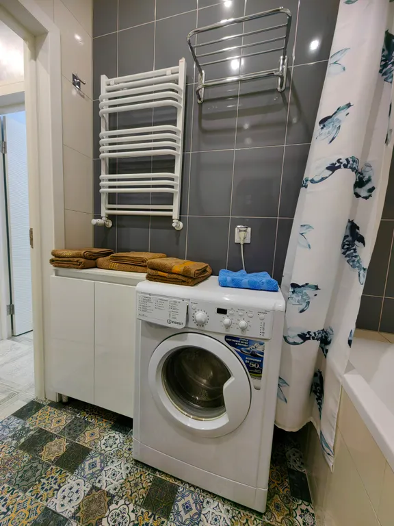 Апартаменты в курортном центре города с видом на озеро