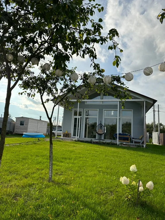 Дом с панорамными окнами и баней