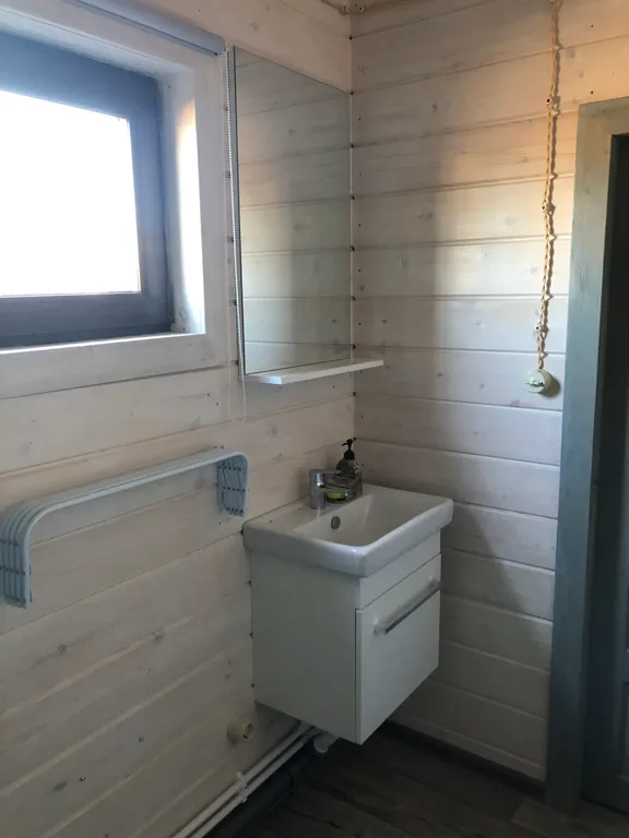 Благоустроенный дом на индивидуальной территории с видом на Байкал