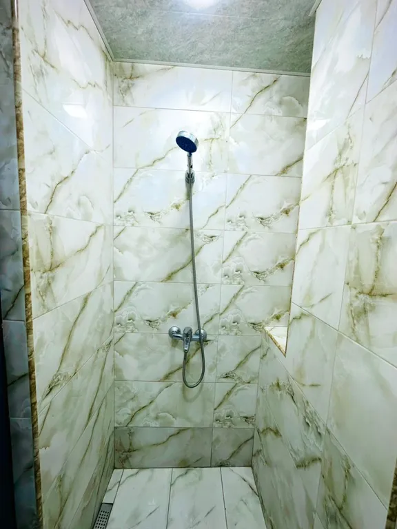 В центре рядом с музеем Сергея Параджанова