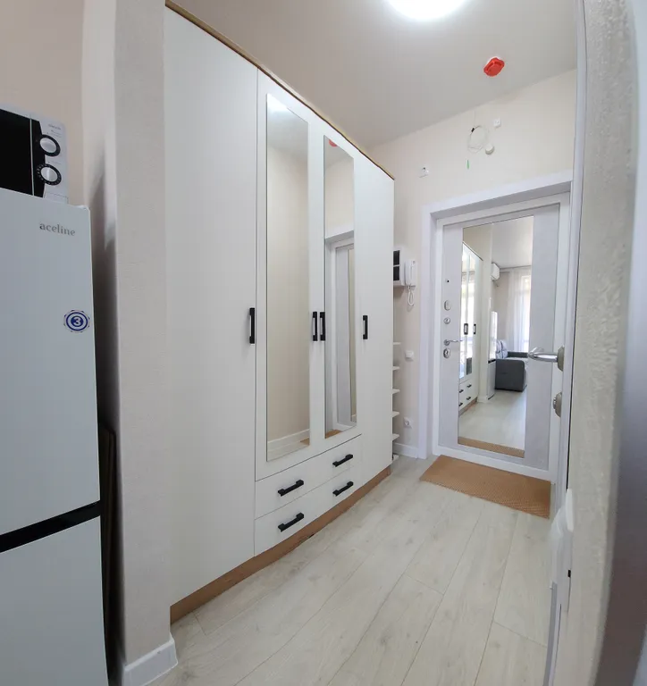 Уютная студия с видом на бассеин