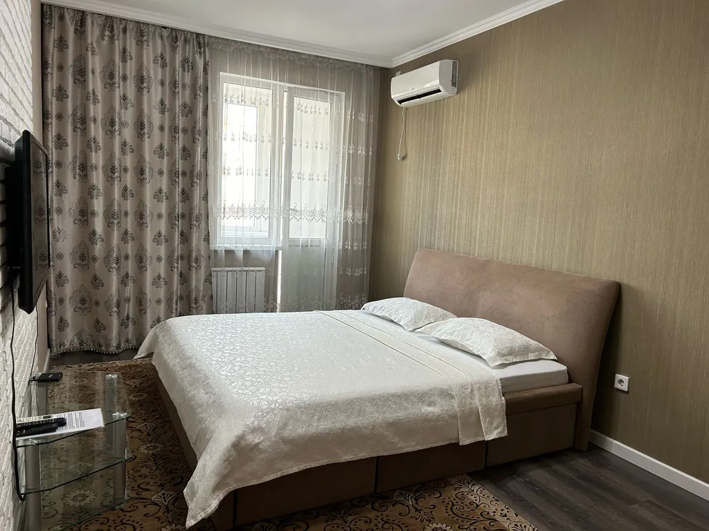 Уютная квартира напротив Алматы Арены