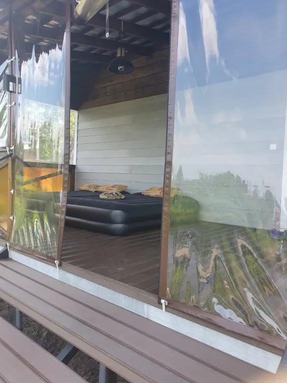 Дом с террасой на берегу реки Кобонка