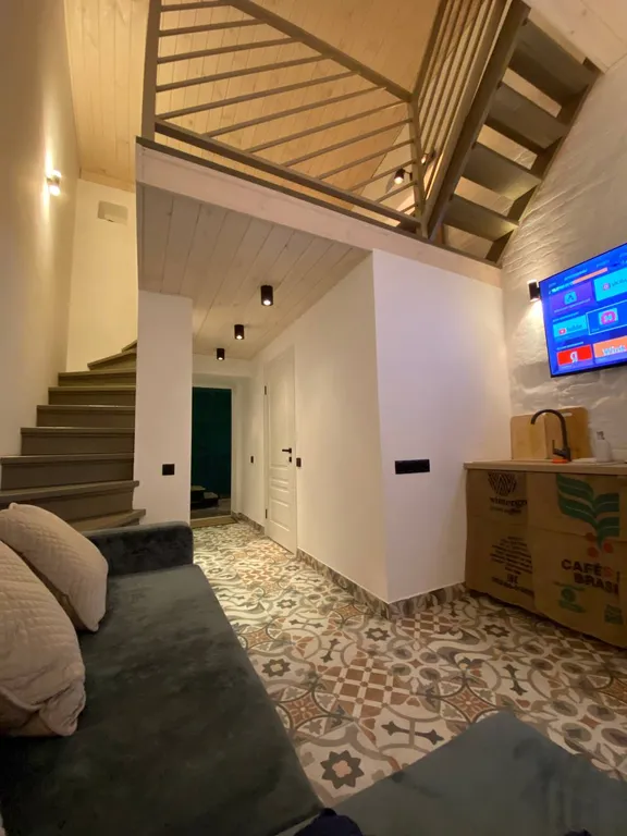 Уютные трехуровневые апартаменты в стиле Лофт в центре города Уровни