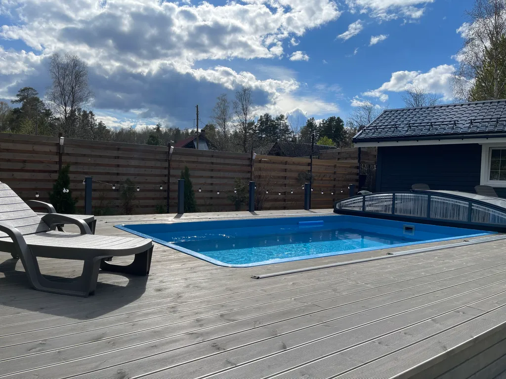 Коттедж Дом с бассейном в Карелии — Деревянное