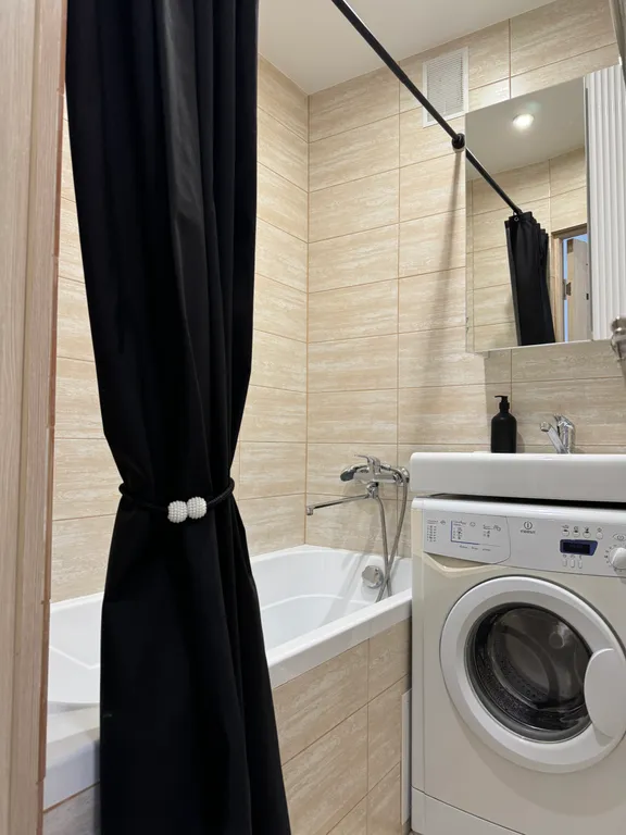 Стильная квартира с видом на колесо Обозрения