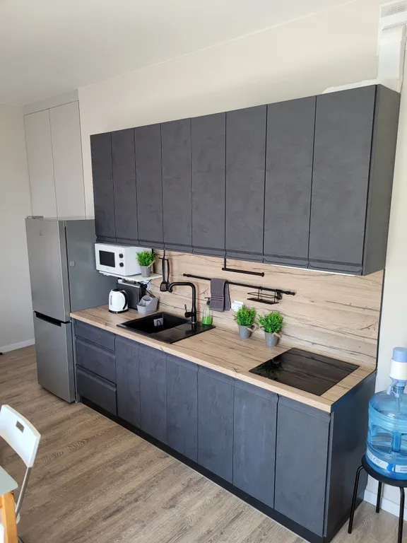 Современная студия у моря с видом на бассейн и горы