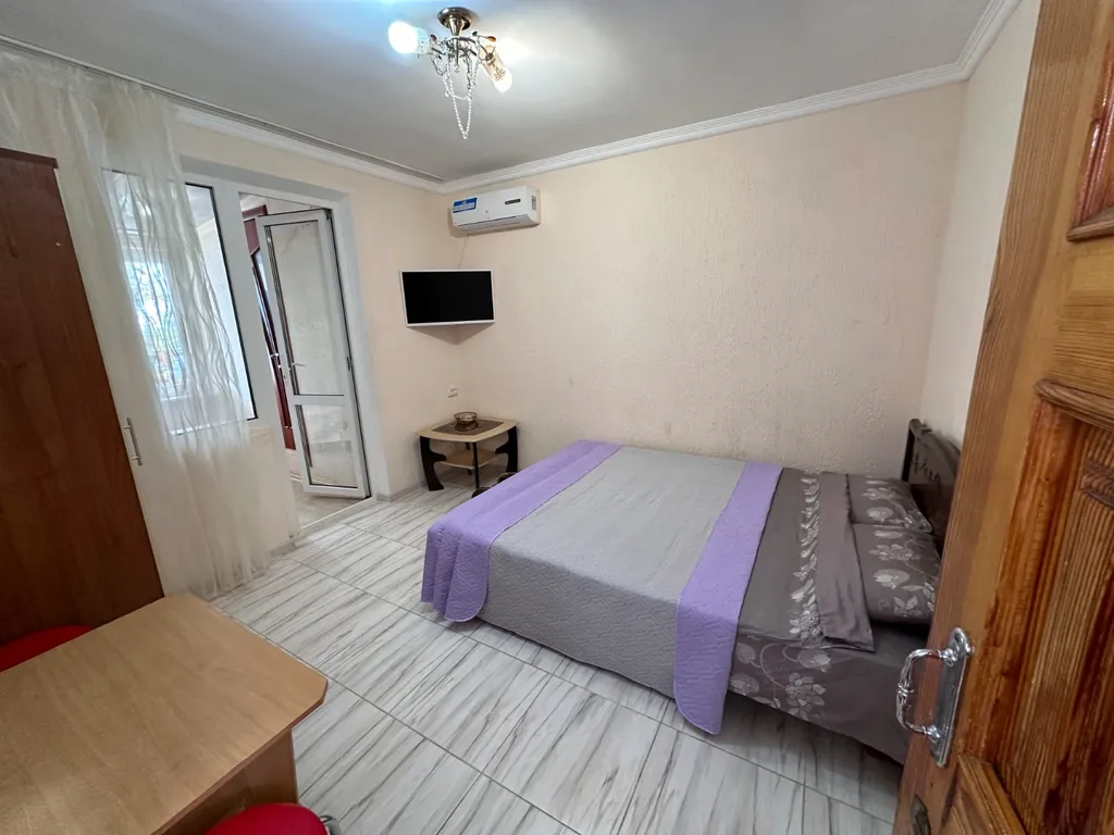 Трехспальный улучшений номер с видом на море