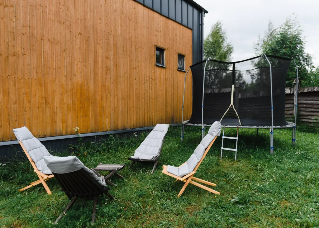 Коттедж с сауной для семейного отдыха в стиле барнхаус