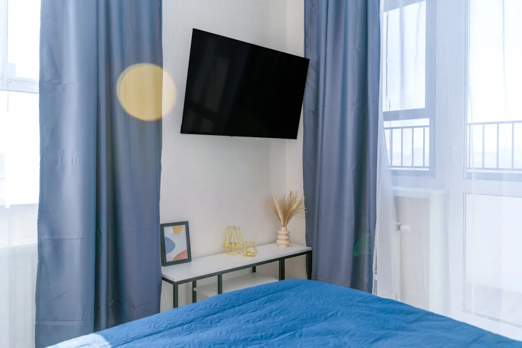 Апартамент с угловой солнечной спальней и видом на город