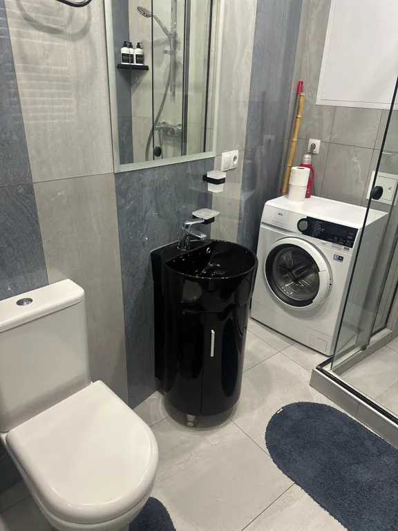 Новые дизайнерские апартаменты в Ваке Axis Towers