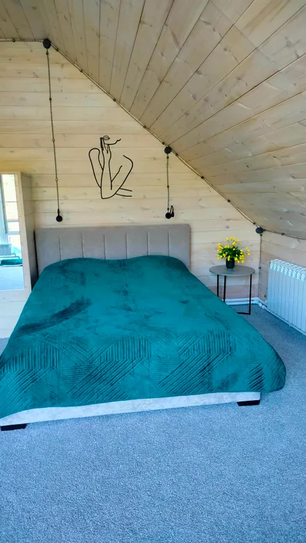 Апартаменты Романтика с панорамным окном в мансарде дома