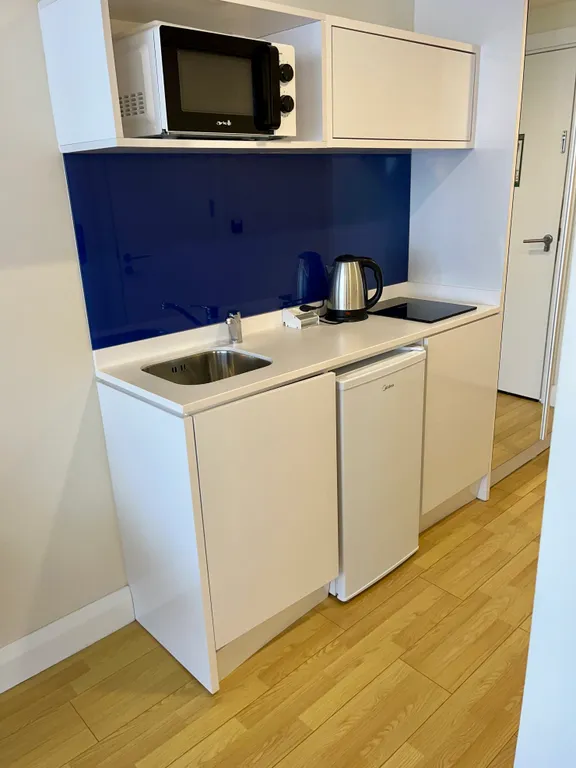 Уютные светлые апартаменты-студия в Орби Сити блок С