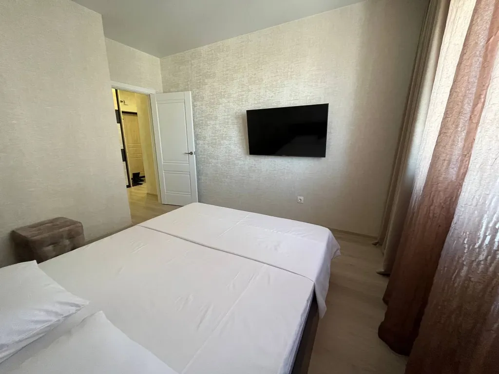 Трехкомнатная квартира-студия в центральном районе