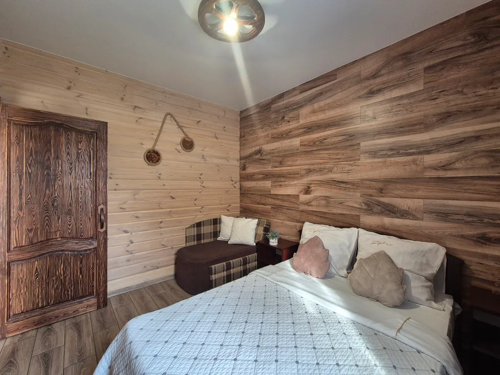 Чудесный дом с сауной и горячей купелью на побережье водохранилища