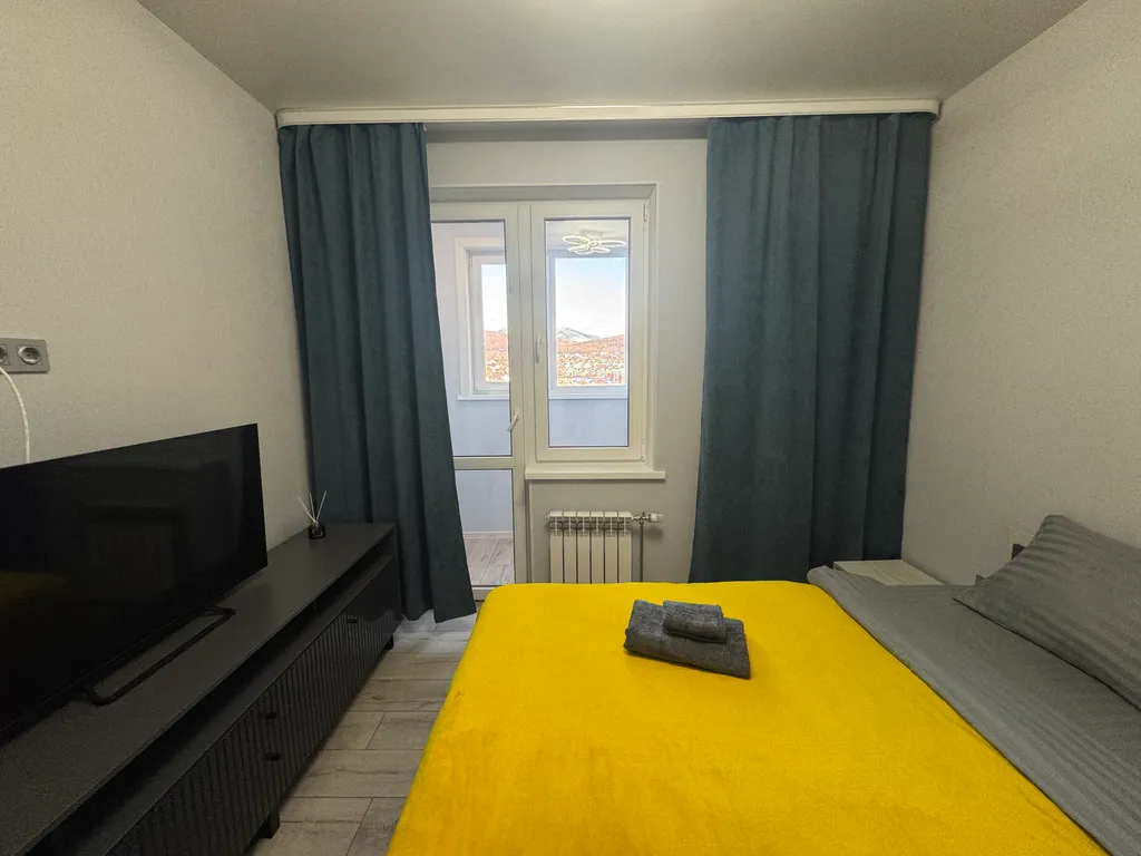 Квартира у Сити-молла с видом на рассвет и горы