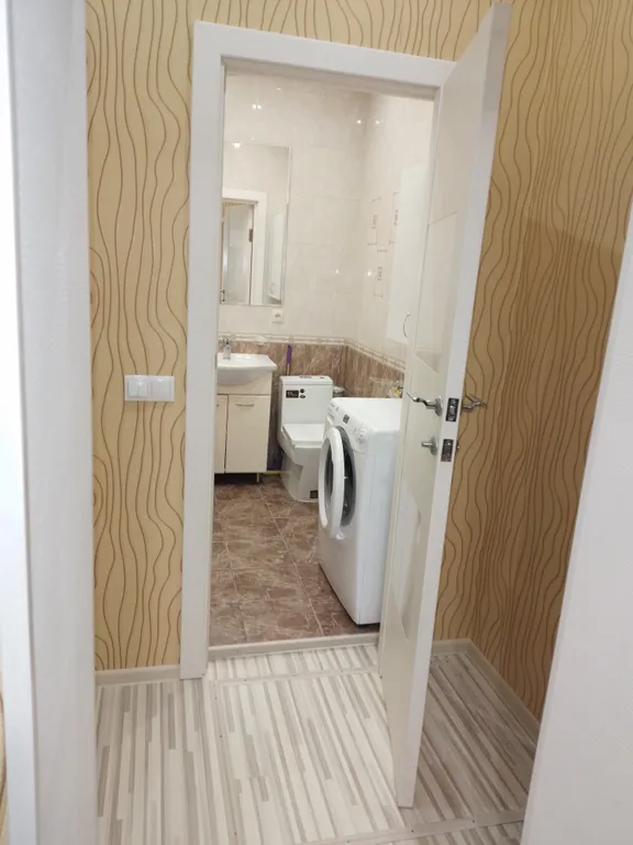 Дом у реки в центре города