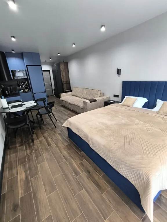 Квартира-студия в окружении хвойного леса и гор.