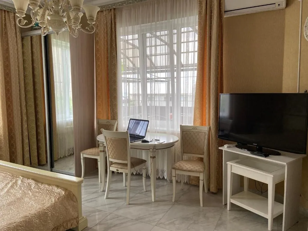 Апартаменты с личной террасой и кухней для семьи из 4 человек