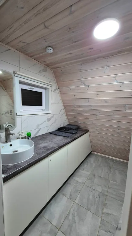 Дом в стиле A frame с чаном