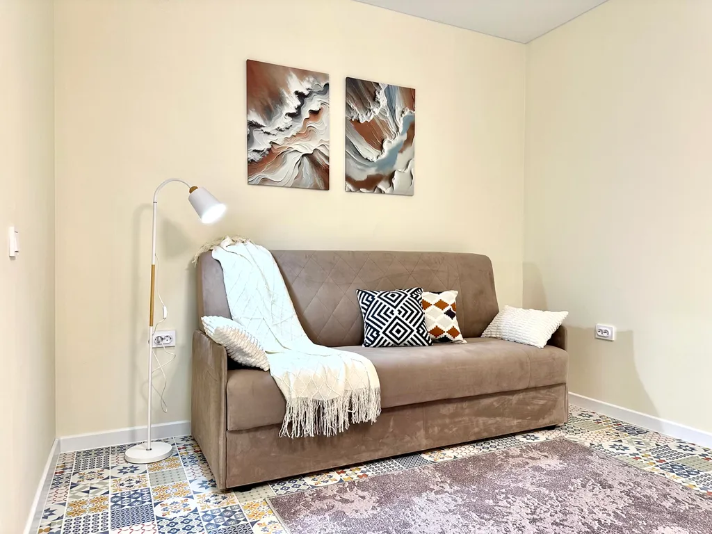 Светлые современные апартаменты в центре города