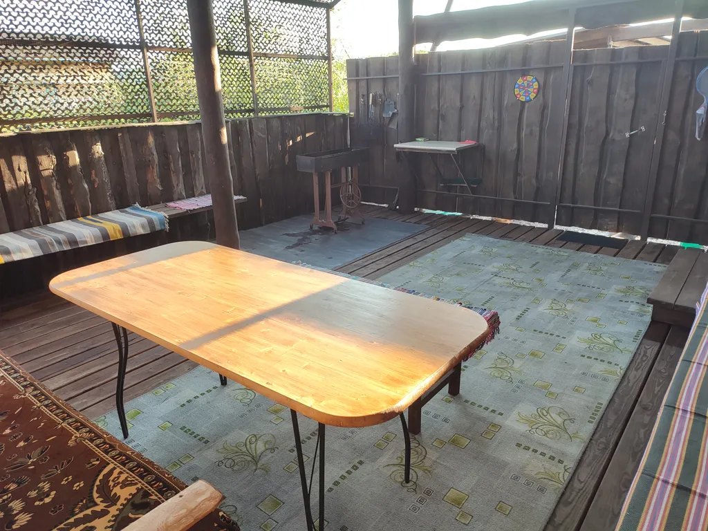 Бревенчатый 2-комнатный эко дом с большой верандой