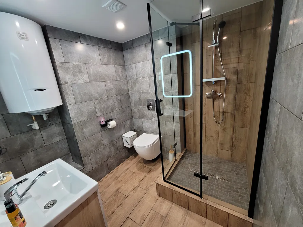 Комфортный двухуровневый апартамент в элитном комплексе Колизей