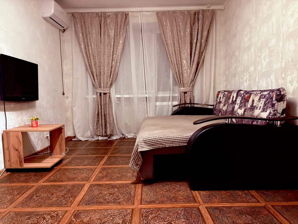 Квартира Уютная двухкомнатная квартира на бульваре — Волгоград