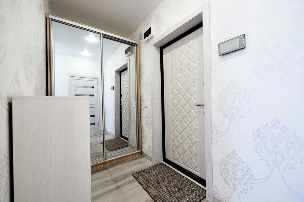 Светлые тёплые апартаменты с видом на горы и город