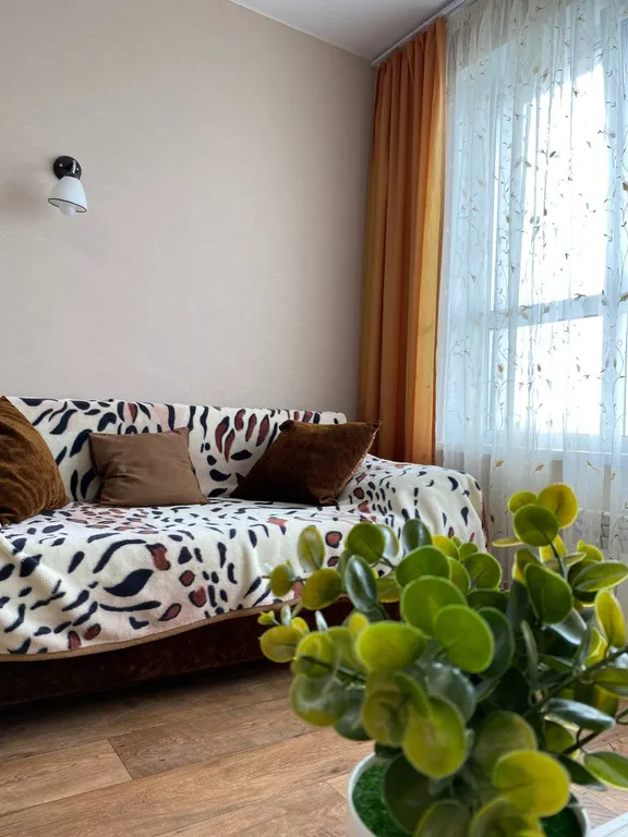 Уютная квартира с ортопедическим матрасом и панорамным балконом