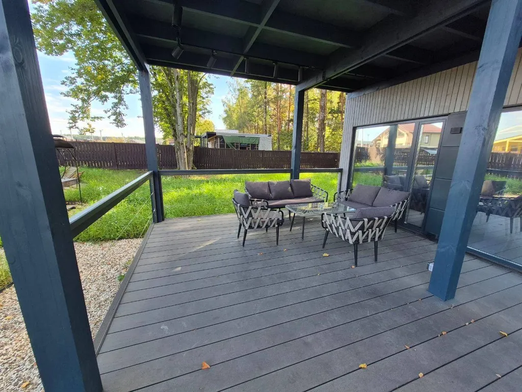 Новый стильный дом с купелью и сауной