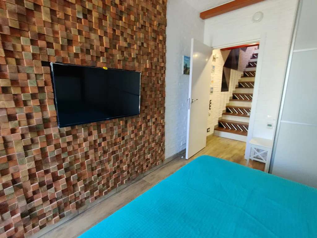 Просторный двухуровневый апартамент в стиле лофт в комплексе Меридиан