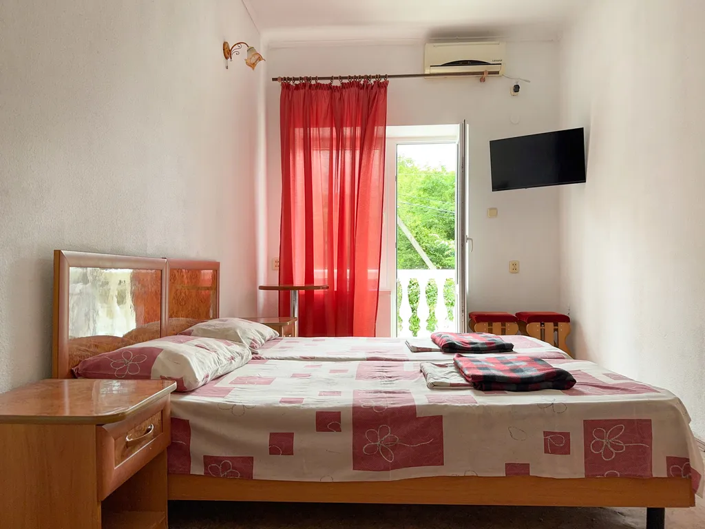 Четырехместный номер с 2 отдельными комнатами и балконами