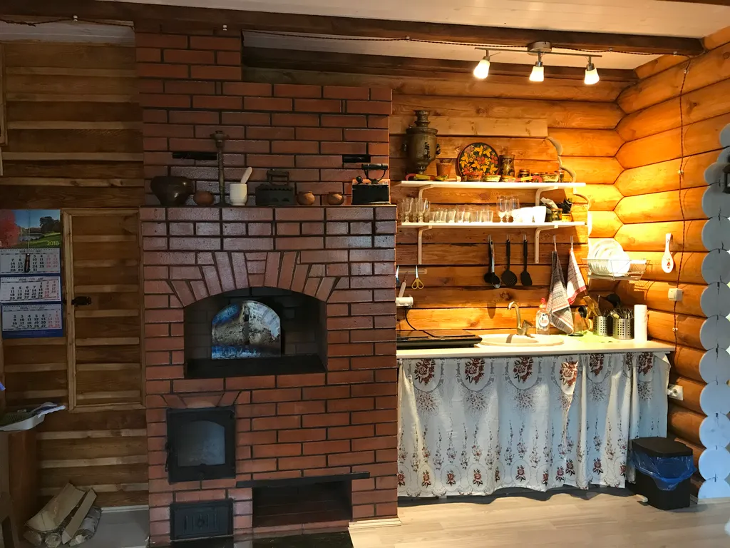 Дом из бревна Терем с сауной в черте города