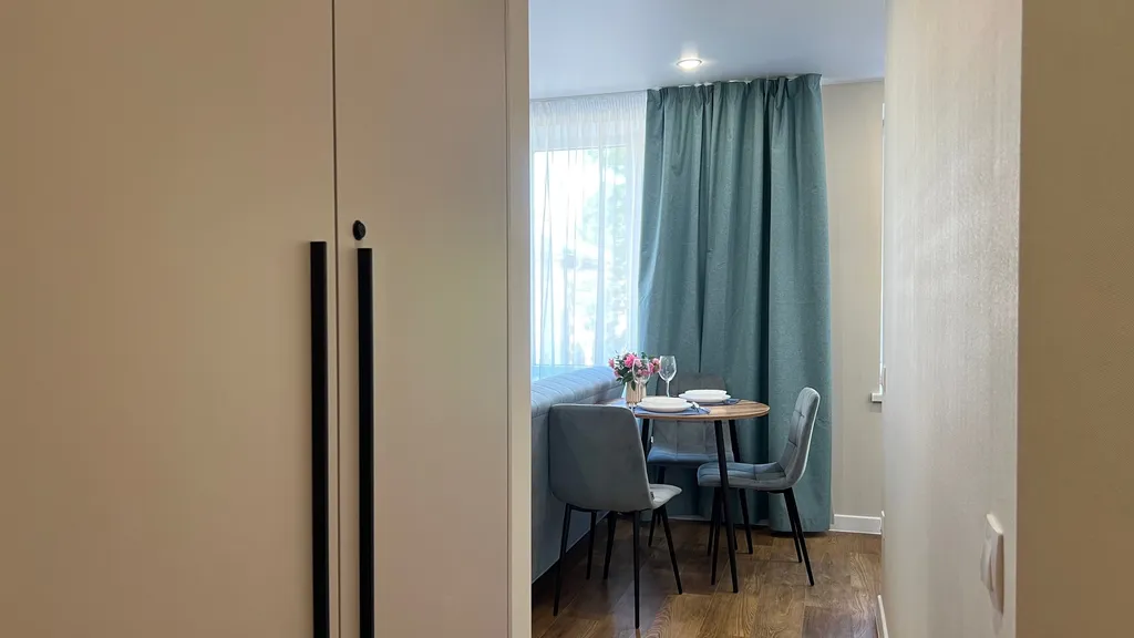 Апартамент у часовой башни и дома гильдии