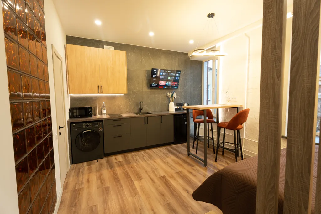 Апартаменты Сити в стиле Лофт в центре города