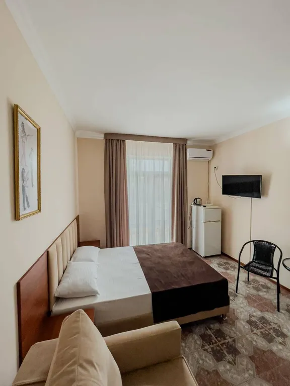 Трехместный номер с балконом