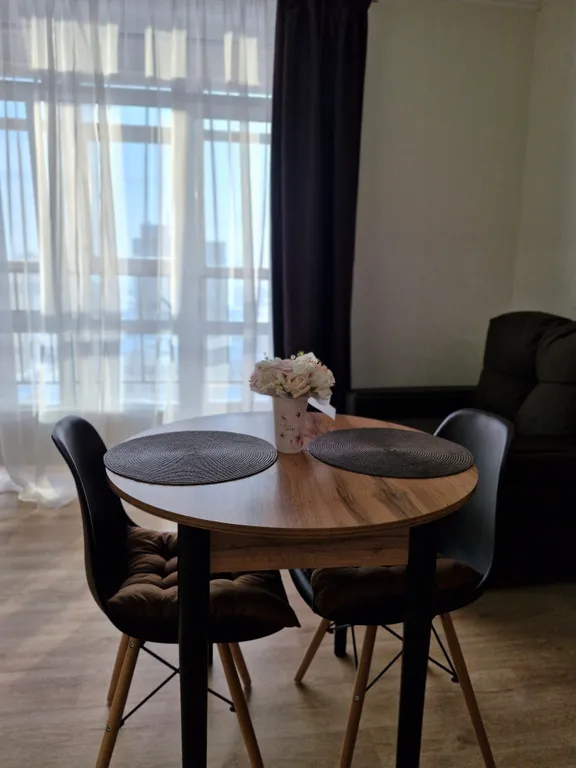 Квартира Уютная студия с панорамным видом рядом с СитиМоллом и горячими источниками — аренда посуточно в Тюмень