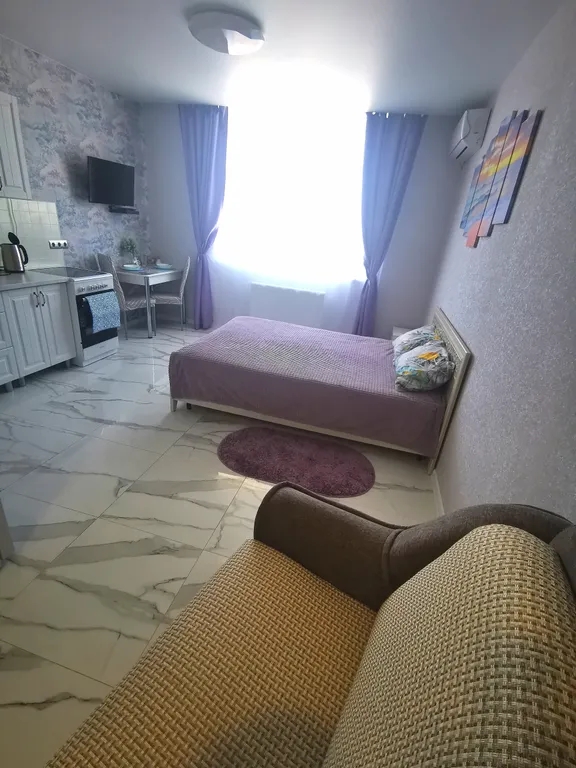 Уютная студия с боковым видом на море