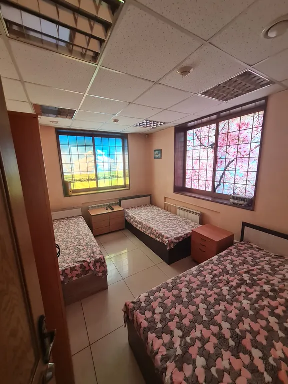 Трёхместный номер с односпальными кроватями