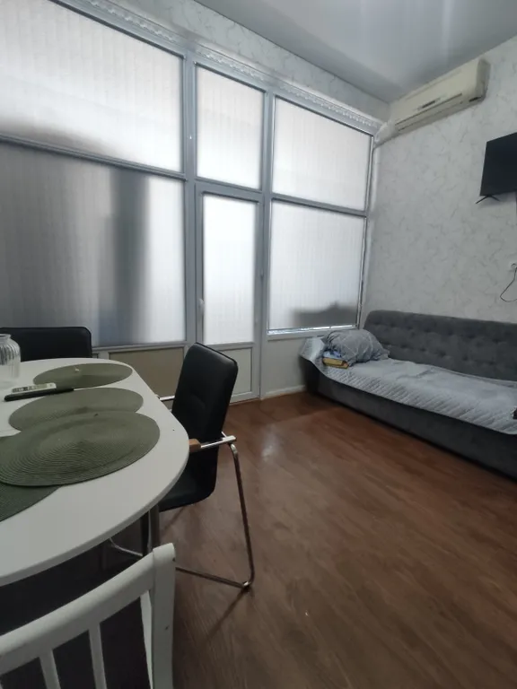 Уютная студия с балконом и видом на море