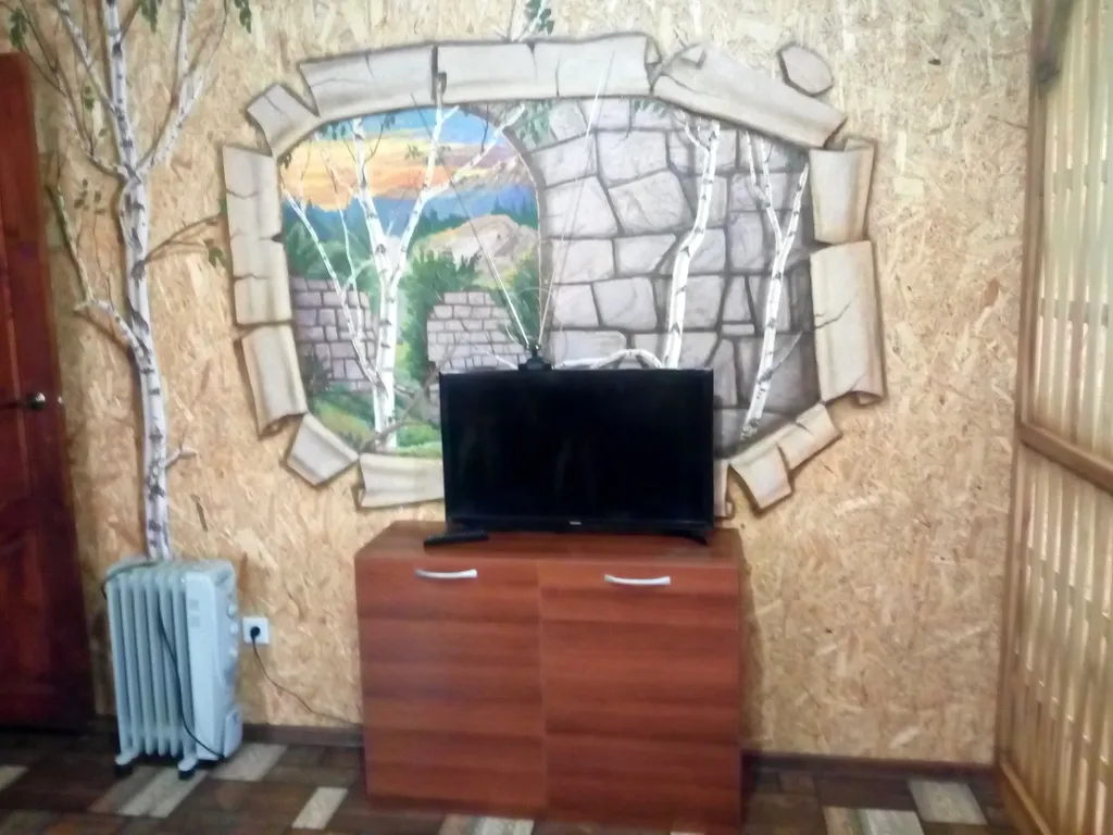 Трёхместный номер с 2 отдельными кроватями с видом на горы