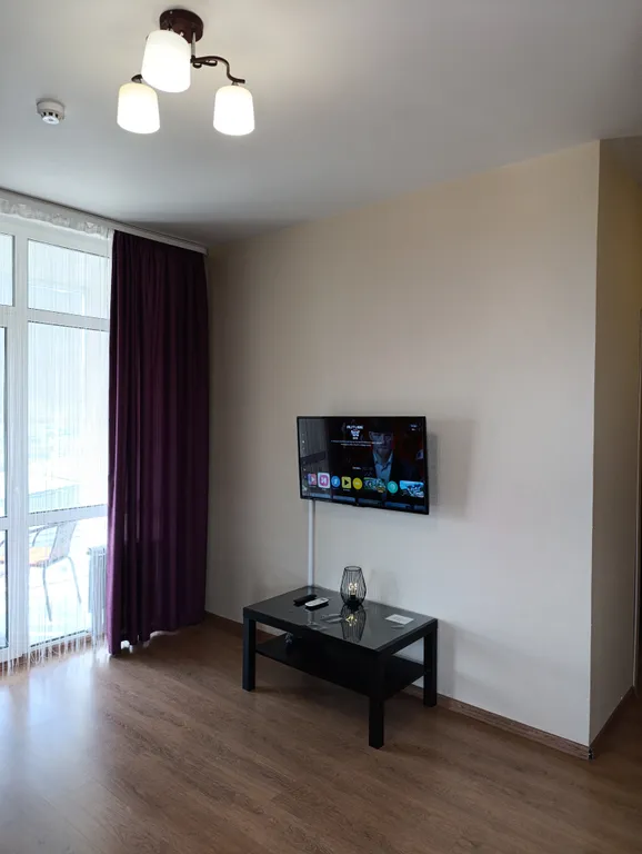 Солнечная квартира с красивым видом на город