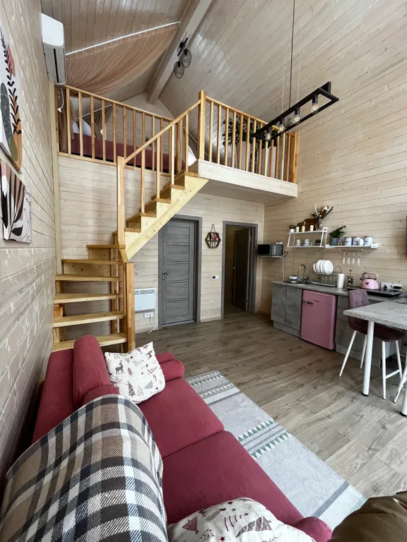 Дом с купелью на берегу реки