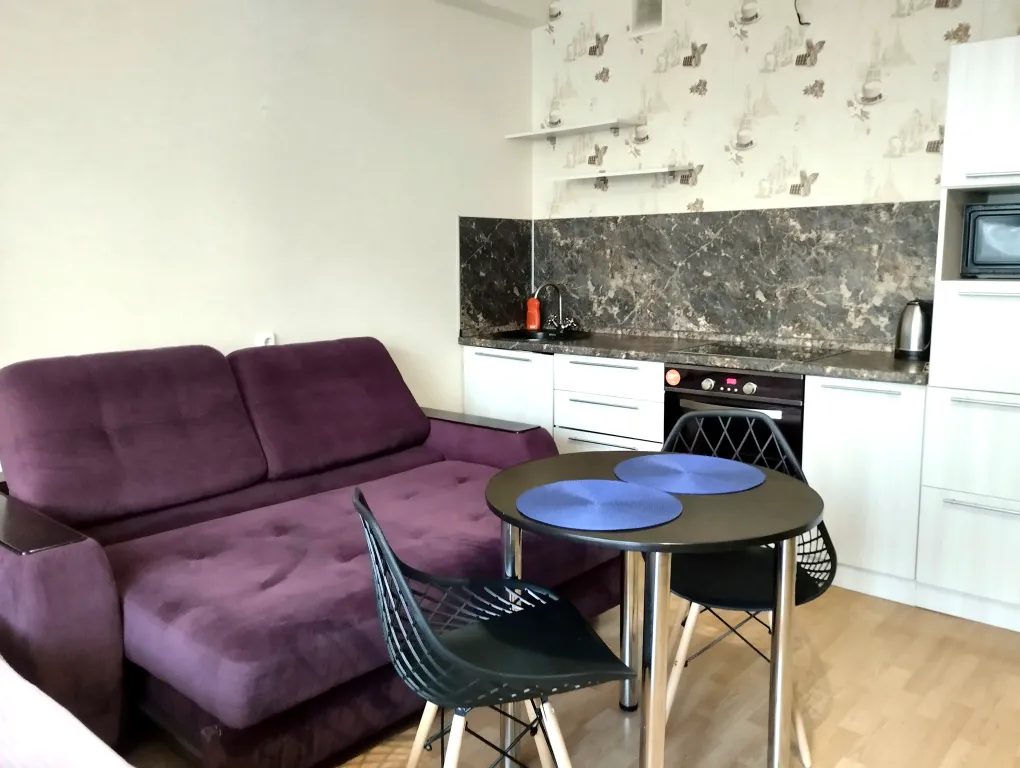 Уютная студия на высоте птичьего полета