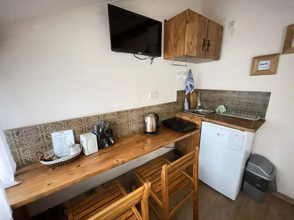 Уютная студия в мансарде грузинского дворика