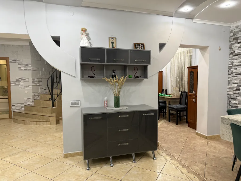 Уютный коттедж в черте города