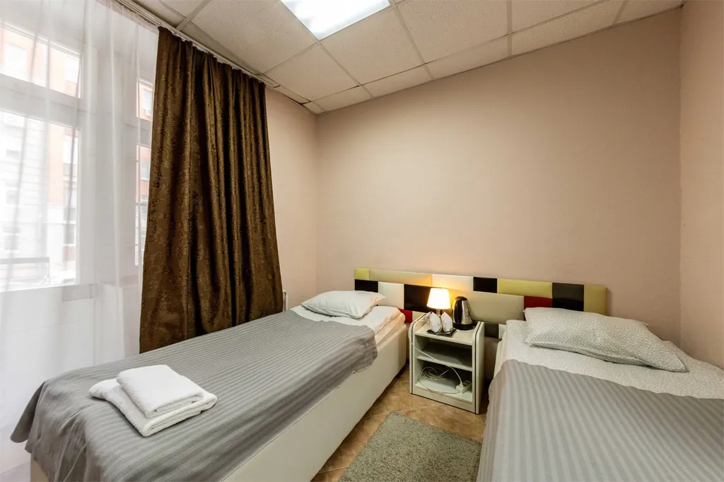 Двухместный номер стандарт с двумя отдельными кроватями